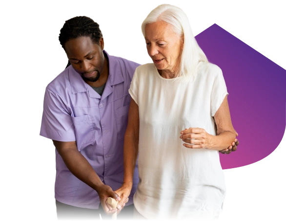 Nurse helping elderly woman with walker