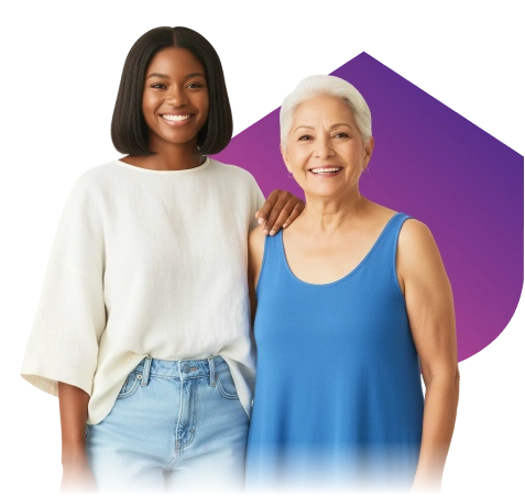 Two smiling women stand together against a black background with a purple geometric shape. The younger woman wears a white blouse and jeans; the older, a blue tank top.