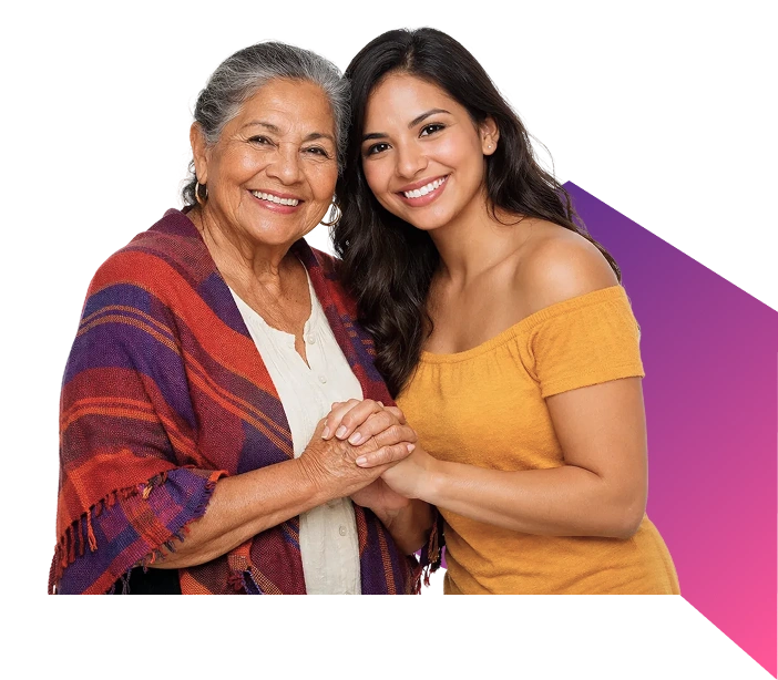 Smiling older woman and younger woman holding hands and posing together