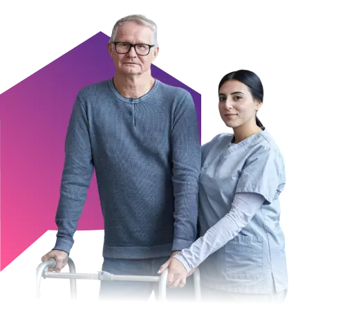 A caregiver in scrubs supporting an elderly man using a walker against a geometric purple graphic background