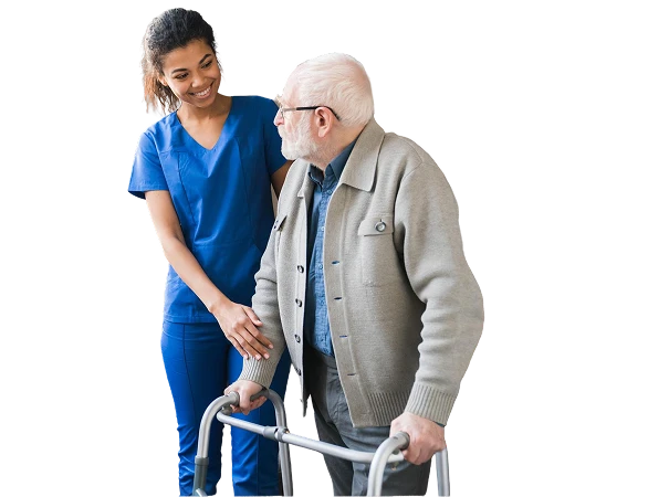 Smiling nurse in blue scrubs assisting an elderly man using a walker.